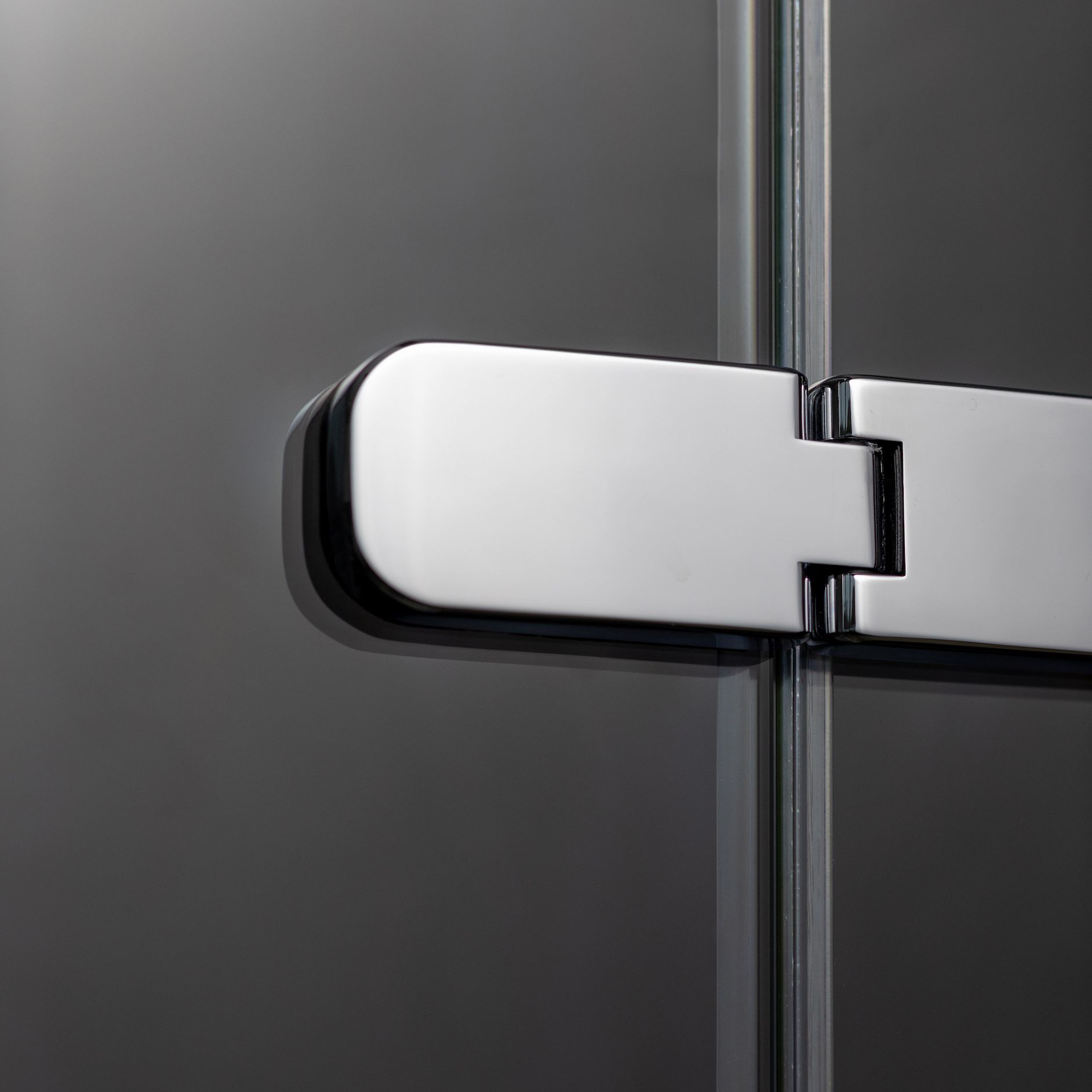 Curved hinge detailing - another modern design treatment to add to the overall clean lines of your ORO shower.
